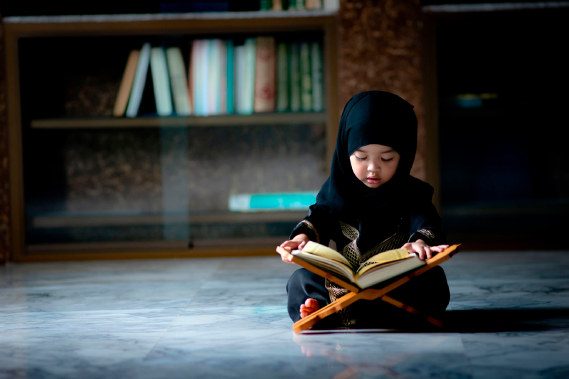 Kids reading Quran